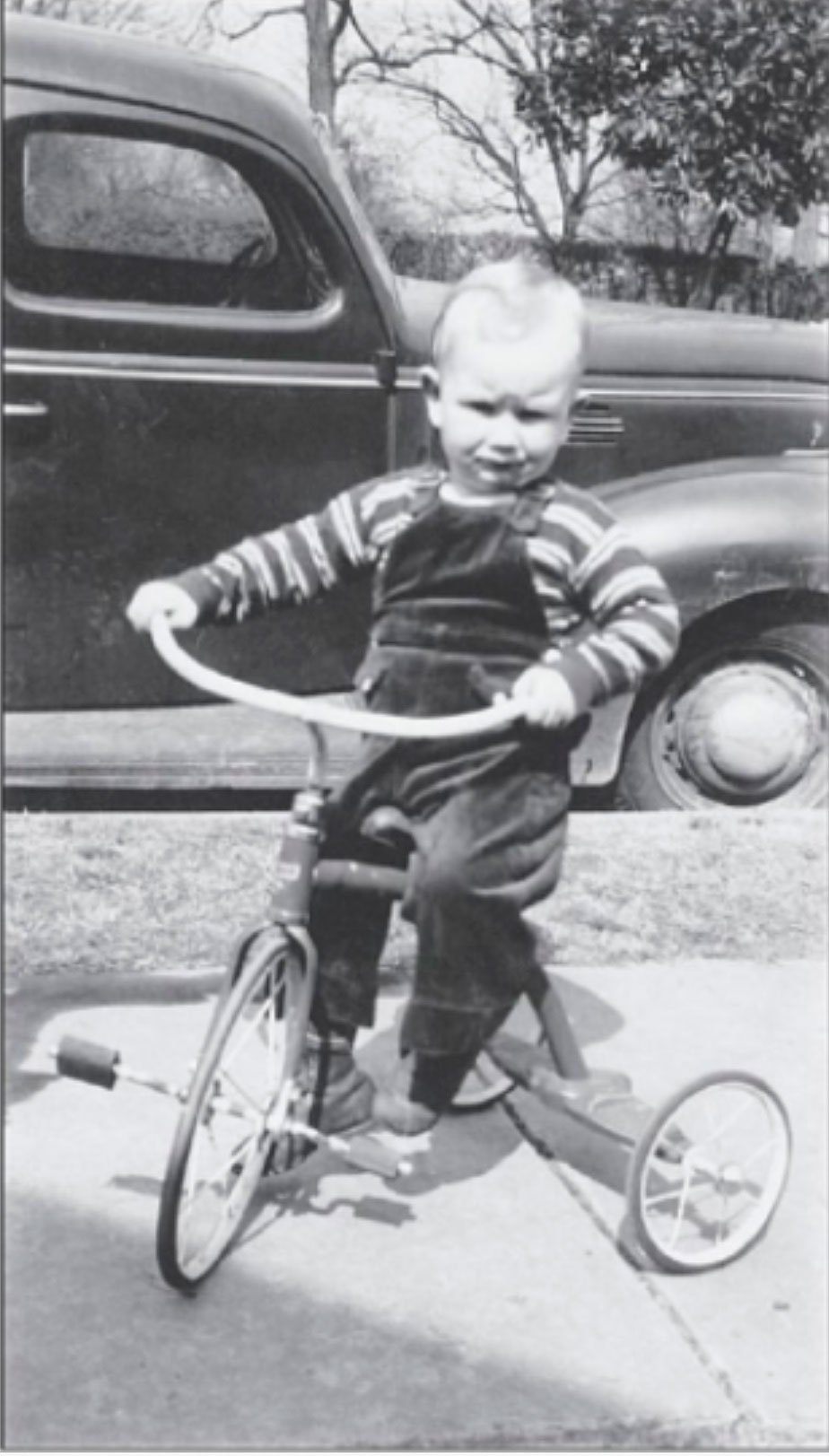 LIFE---Truman-Parrott-riding-a-tricycle-at-his-childhood-home-in-downtown-Homewood----courtesy-of-Howard-Onorato.jpg